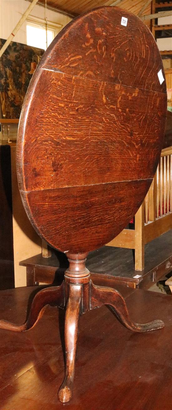 Tilt top circular oak table